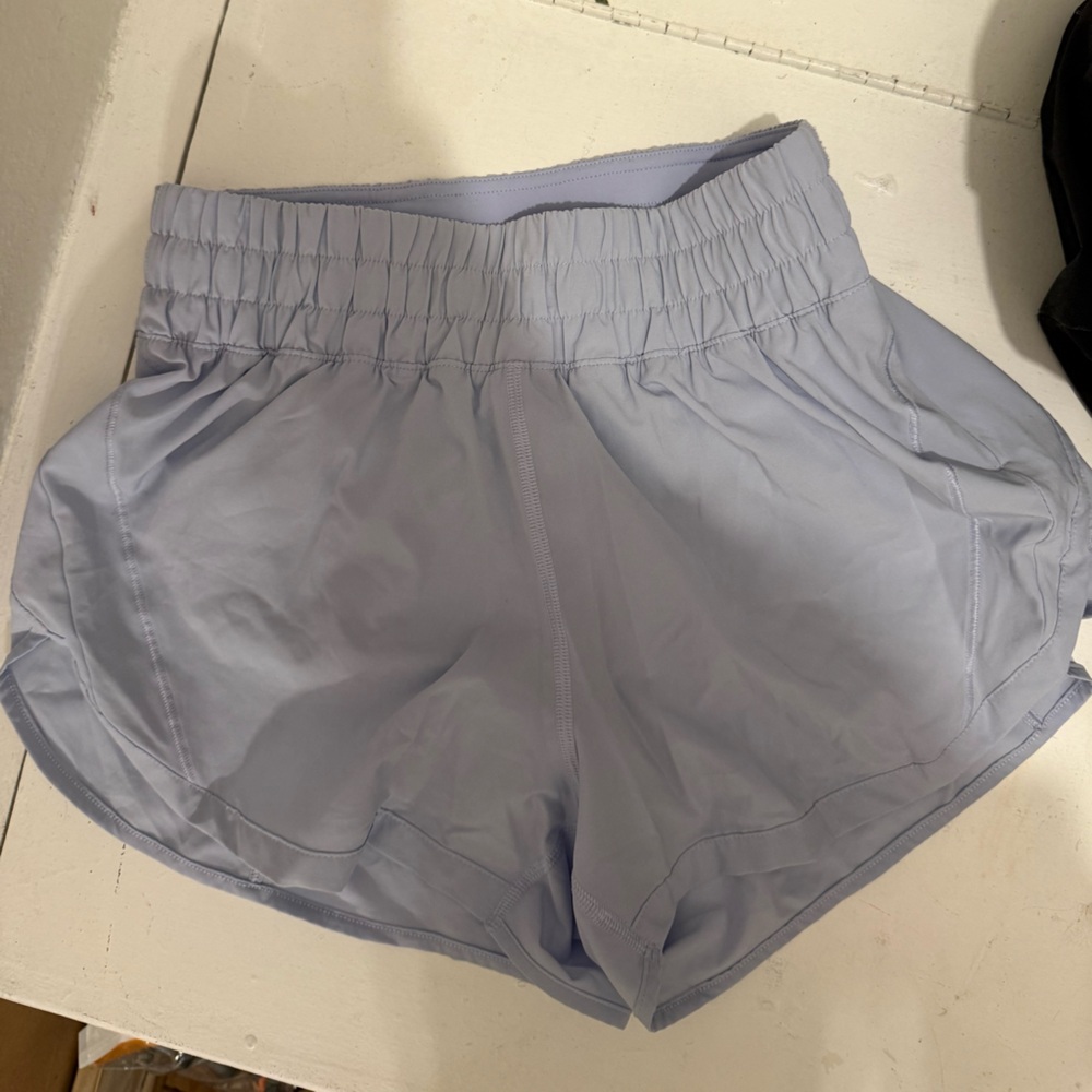 Lilac high waisted shorts from lululemon. Only worn a couple times! Size 6!